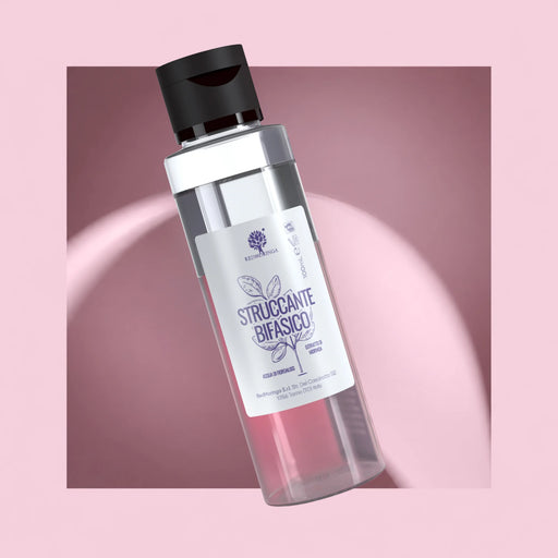 Zweiphasiger Make-up-Entferner von RedMoringa mit Moringa und Kornblumenwasser, 100-ml-Flasche auf rosa Hintergrund